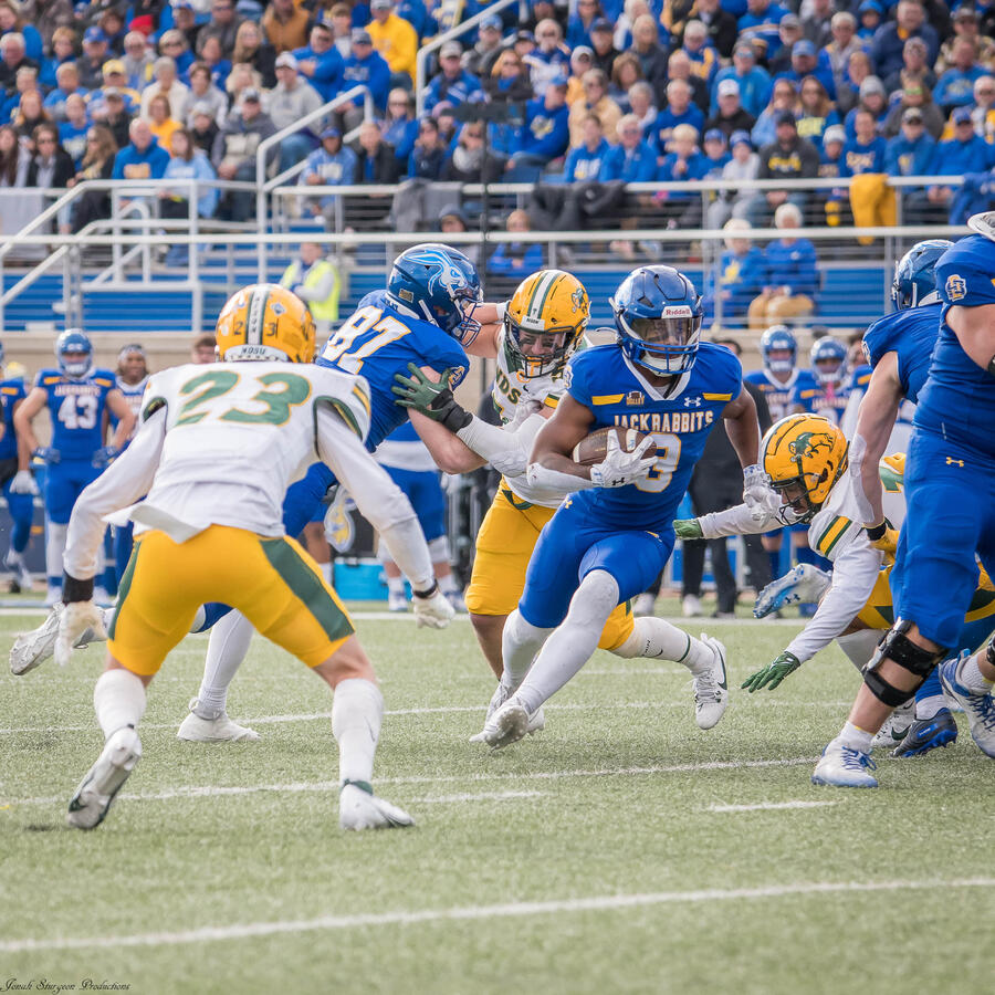 Amar Johnson runs the football against NDSU